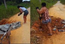 Mãe e filha metem a mão na massa para consertar buraco na Rua Laci Simão Corrêa em Penha