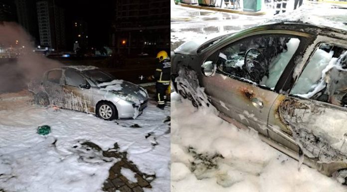 Carro pega fogo ao lado de posto de combustíveis na BR-101 em Itapema